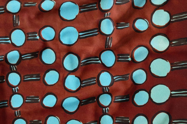 Wilkinkarra Fabric 3m – Blue and Black on Burnt Sienna (Tencel Linen)